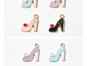 Detailed macro view of high heel charms in colorful enamel with small metal hanging loops