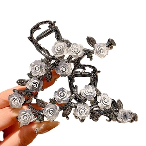 Elegant large metal hair claw clip with white glittery roses and dark gemstones