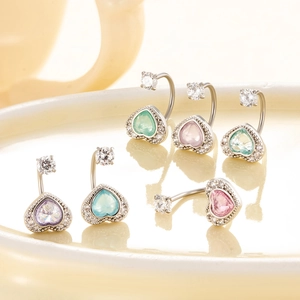 Set of surgical steel heart-shaped belly rings with colorful cubic zirconia crystals