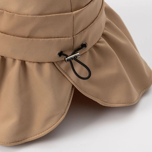Women's khaki sun hat with wide ruffled brim and adjustable metal buckle drawstring