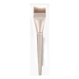 Champagne handle crescent foundation brush with soft bristles and flat angled head