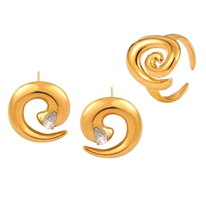 Spiral twisted gold plated jewelry set featuring drop-shaped crystal earrings and open ring