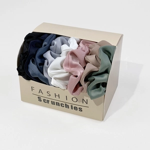 Set of 6 premium satin scrunchies in varied colors within an elegant gift box