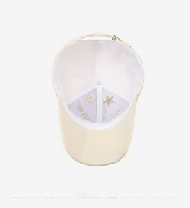 Detail view of the baseball cap's interior structure with gold star embroidery