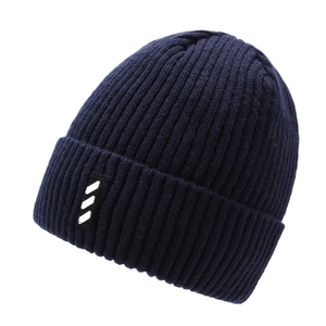 Thick navy blue ribbed knit beanie for men with folded cuff and athletic stripe patch