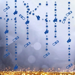 Close-up of blue glitter graduation hanging swirls with stars and scrolls decor