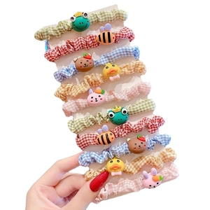 10-piece set of kids cartoon scrunchies with plaid fabric and cute animal charms