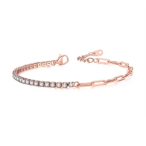 Detail of rose gold tennis and paperclip chain bracelet with zircon and lobster clasp
