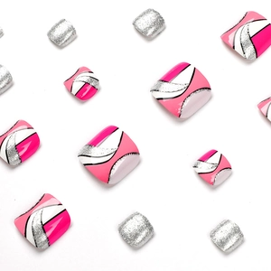 Faux ongles d'orteils géométriques avec design pailleté rose, blanc et argent