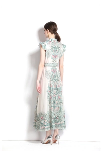 Rear view of vintage A-line long dress with floral print and flutter sleeves