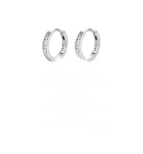 Detail of S925 sterling silver hoop earrings with star patterns and moissanite stone