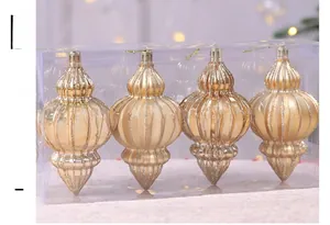 Vier goldene Weihnachtskugeln in Zwiebelform mit Glitzer in Klarsichtbox Details