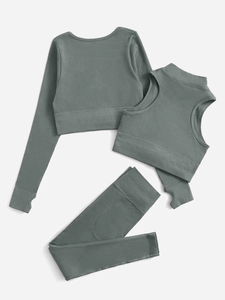 Detailed flat lay of sage green ribbed yoga set including long sleeve top and leggings