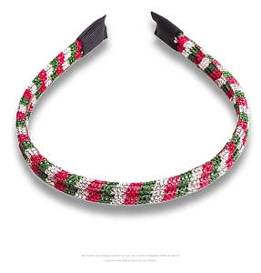 Close-up of red and green rhinestone Christmas headband with high-quality sparkling gems