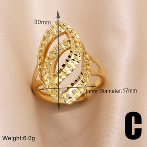 Detailed view of irregular hollow gold ring with leaf design and 30mm height dimension