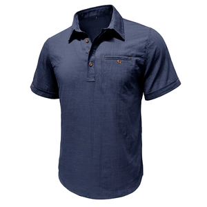 Detail view of navy blue cotton linen short sleeve shirt with wooden style buttons