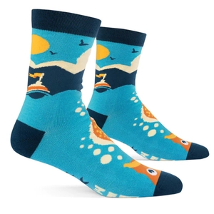 Close-up of blue cotton socks featuring ocean, island, and sun cartoon patterns