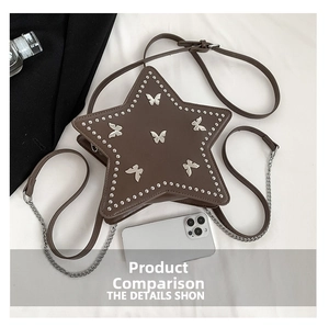 Close-up of star-shaped Y2K crossbody bag with silver butterfly studs and metal chain strap