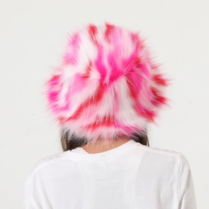 Rear view of pink and white striped faux fur bucket hat with long plush texture