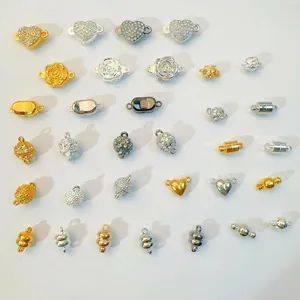 Assorted DIY jewelry magnetic clasps in heart, rose, and cylindrical shapes with rhinestones