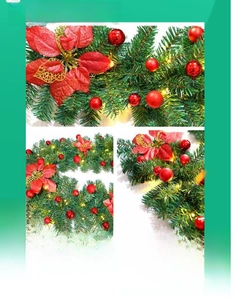 Close-up of 2.7m Christmas garland featuring red poinsettia flowers and green pine needles