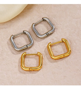 Detail of square geometric hoop earrings in 18K gold and silver stainless steel finish