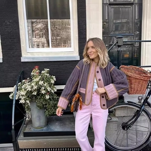 Women's quilted color-block jacket in purple and pink with high-waist straight trousers