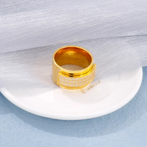 Macro view of 18k gold plated wide ring with three rows of micro-paved cubic zirconia