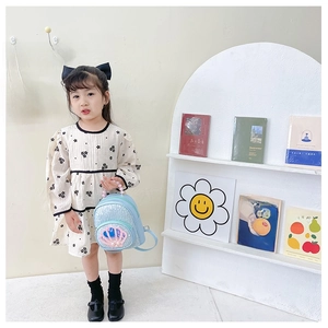 Toddler girl sequin backpack featuring shell pocket and pearl trim details