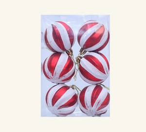 Close-up of 6cm red and white striped Christmas ball ornaments in clear box with gold strings