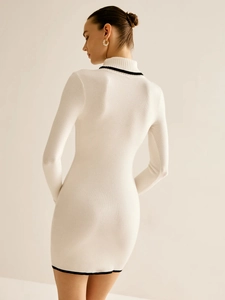 Slim fit white knit dress with mock neck and black trim details, elegant back view