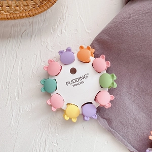 Miniature bear-shaped candy color hair clips in 10-piece set on round brand card