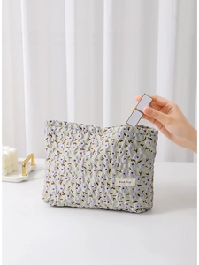 Floral makeup bag in light green with purple flower pattern for high-end cosmetic storage