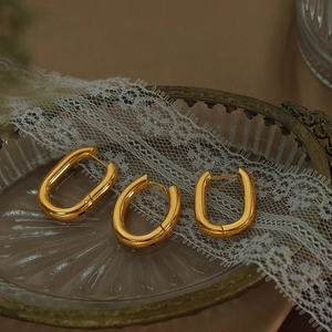 Three-piece gold plated stainless steel U-shaped hoop earrings set in minimalist design
