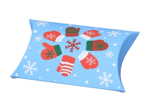 Detailed view of a blue Christmas pillow gift box with red glove and snowflake patterns