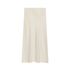 Detail of champagne satin midi skirt showing smooth silk-like texture and elegant drape