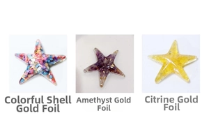 Macro detail of starfish resin charms with crushed crystals, seashells and gold leaf inserts