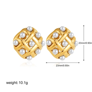 Detail view of 23mm 18k gold mesh earrings with embedded pearls weighing 10.1g