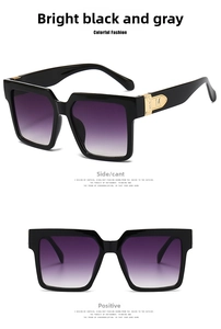 Detail of square oversized sunglasses with glossy black frame and gold metal M logo hinge