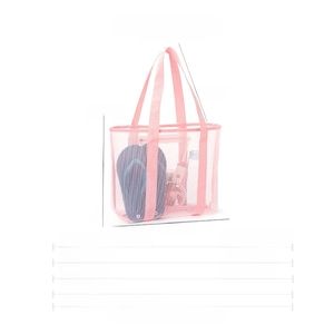Pink mesh beach bag detail showing 29x12x43cm dimensions and large capacity for travel