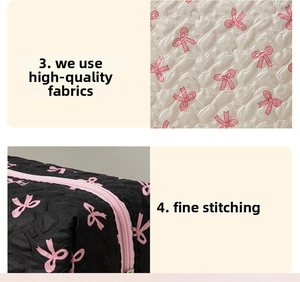 Close-up of high-quality quilted fabric with bow print and fine stitching detail