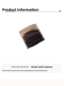 Vue rapprochée d'élastiques à cheveux spirales en divers tons de terre et couleurs