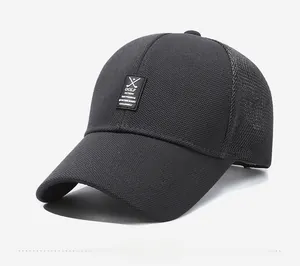 Detail of dark gray golf baseball cap showing breathable mesh panels and square logo
