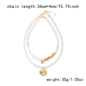 Détail du collier double rang étoile de mer et coquillage, 40cm et poids de 30g