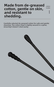Detailed close-up of 2-in-1 black cotton swabs with spiral and round head design