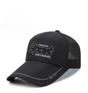 Detailed view of Sport embroidery and breathable black mesh on the baseball cap