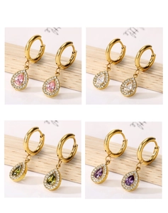 Detail view of pear-cut zircon hoop earrings in pink, green, white, and purple finishes