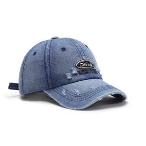 Vintage washed navy denim baseball cap with Alfred embroidery and distressed edge details