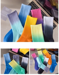 Close-up of vibrant gradient tie-dye crew socks featuring premium ribbed cotton texture