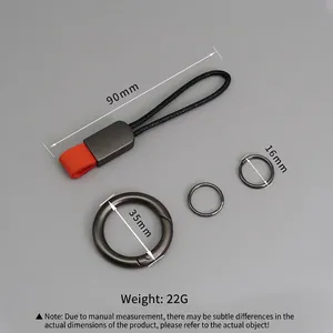 Porte-clés créatif en cuir tressé noir avec étiquette orange et trois anneaux